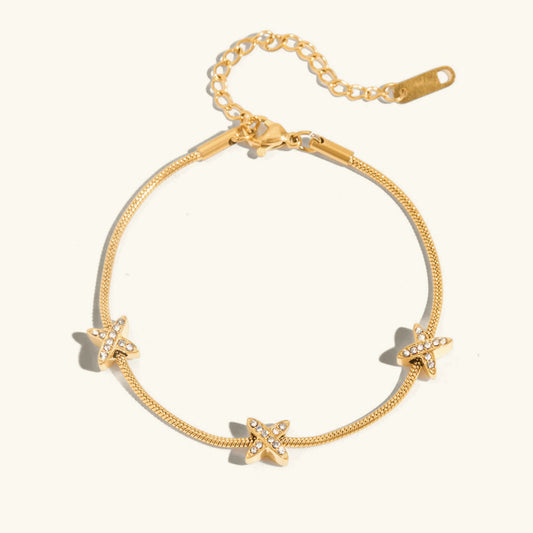 Croisette Herringbone Bracelet · 18K Gold Finish & Hand-Set Stones